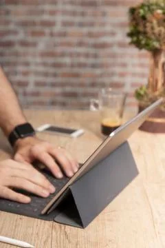 Man using a tablet computer to work Stock Photos