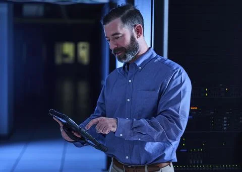 Man using tablet in data center Stock Photos