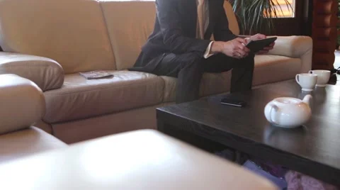 Man using a tablet in the elite cafes Stock Footage 58590984