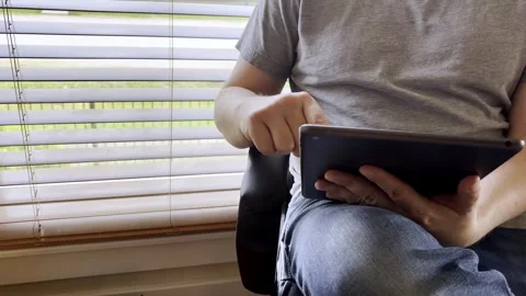 Man using a tablet Stock Footage 310418310