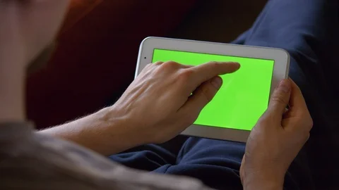 Man Using Tablet Green Screen 02 4K Video stock 86926612