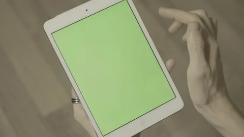 Man using tablet with green screen. Close up shot hands with mobile Stock Footage 89533183