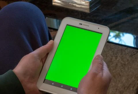 Man using a tablet with green screen Stock Photos