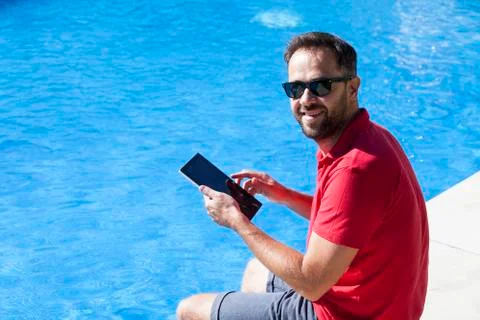 Man using tablet for home automation. Stock Photos