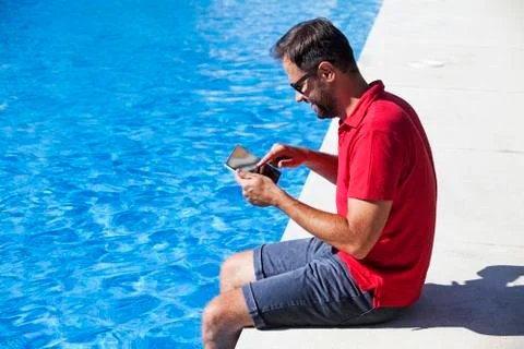 Man using tablet for home automation. Stock Photos