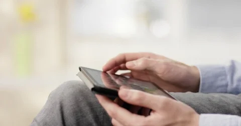 Man using Tablet at home Stock Footage 85329789