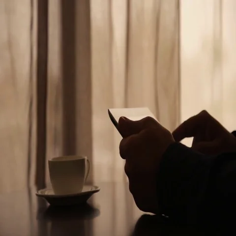 Man Using Tablet PC and Drinking Coffee in Cafe Stock Footage 69577003