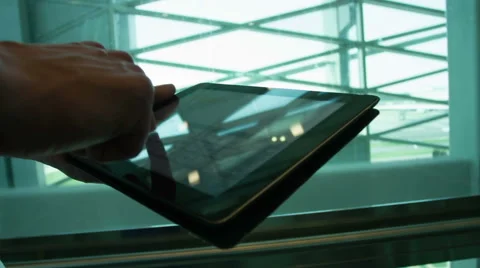 Man Using Tablet PC Indoors Stock Footage 51831431