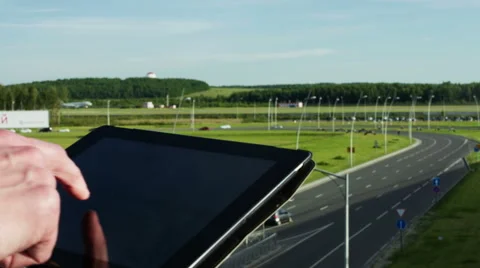 Man using tablet pc outdoors. Stockbeeldmateriaal 51809227