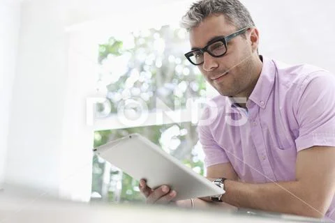 Man using tablet pc Stock Photos