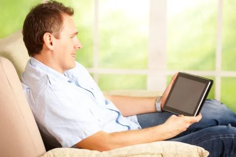 Man using tablet Stock Photos