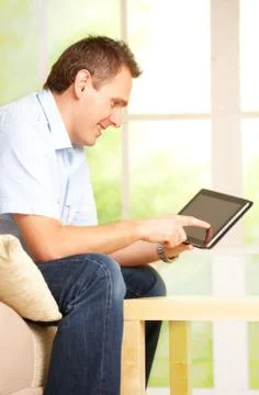 Man using tablet Stock Photos