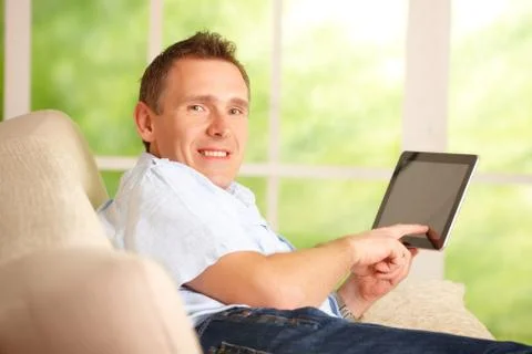 Man using tablet Stock Photos