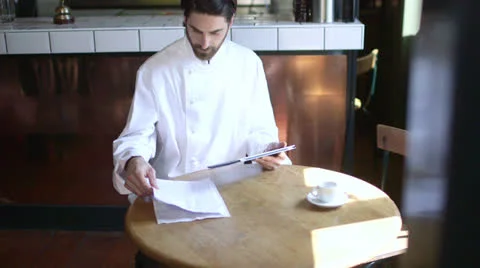 Man using tablet, small business, chef Stock Footage