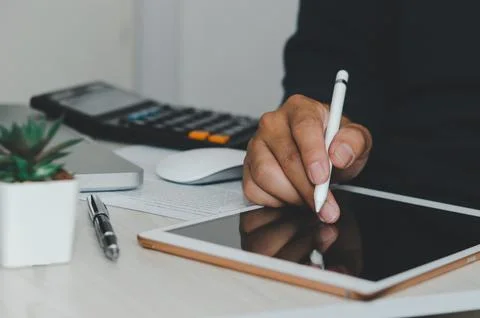 Man using tablet for work. Stock Photos
