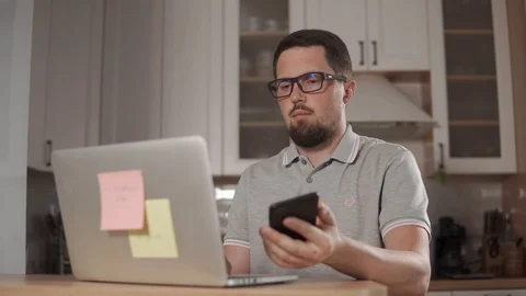 Man using technologies in the kitchen. Stock Footage 91809130