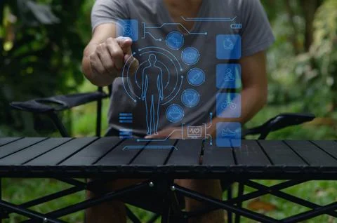 Man Using Technology for Health and Care Solutions in Nature Stock Photos