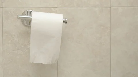 A man using tolet paper Stock Footage 131923968