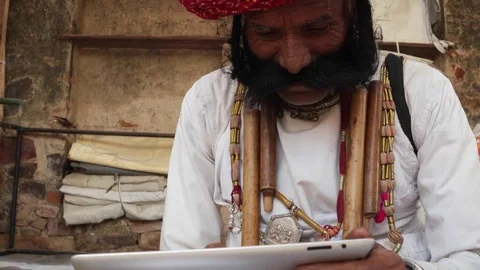 Man using a touch-screen tablet Stock Footage 69767627