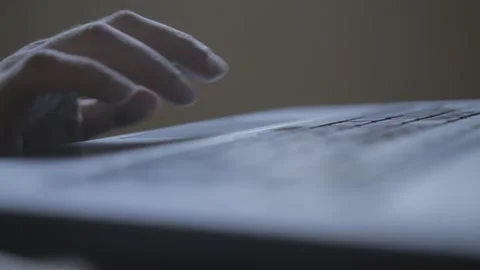 Man using trackpad on old notebook with super shallow depth of field  Stock Footage 138785132