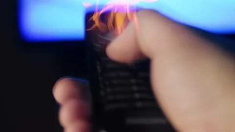 A man using a tv remote console Video stock 224894675