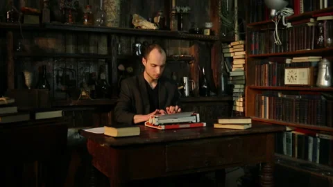 Man Using A Typewriter Stock Footage 86898375