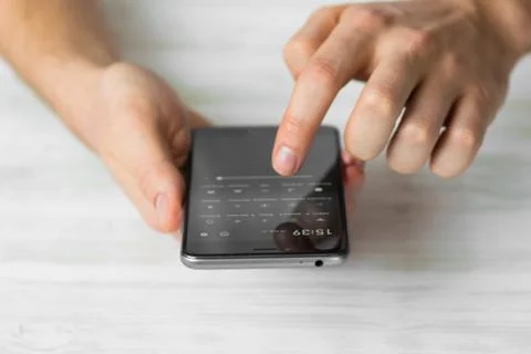 Man using using black smartphone a touch screen smart phone hands close up, v Stock Photos