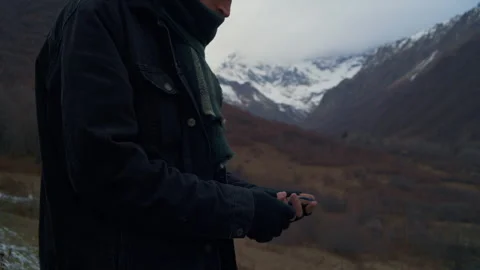 Man Using Vintage Compass to Navigate in the Mountains 库存影片 302215177