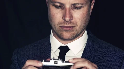 Man using Vintage Stills Camera Stock-Footage 90040857
