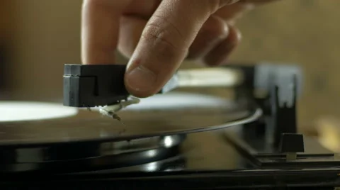 Man using a vinyl record player Stock Footage 67109864