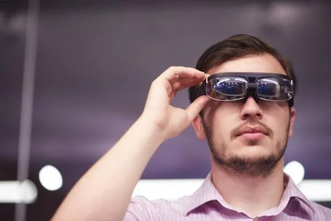  man using virtual reality gadget computer glasses young man using virtual... 写真素材