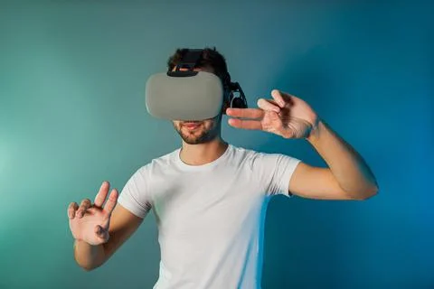 Man using virtual reality glasses for virtual shopping Stock Photos