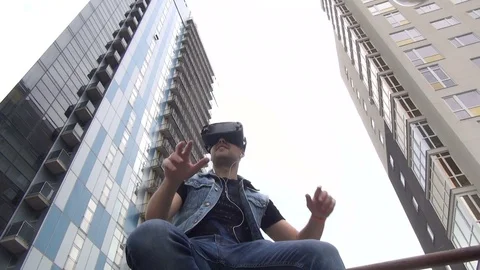 Man using virtual reality headset at office 4k Stock Footage 74129843