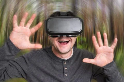 Man using virtual reality headset glasses - virtual reality concept Stock Photos