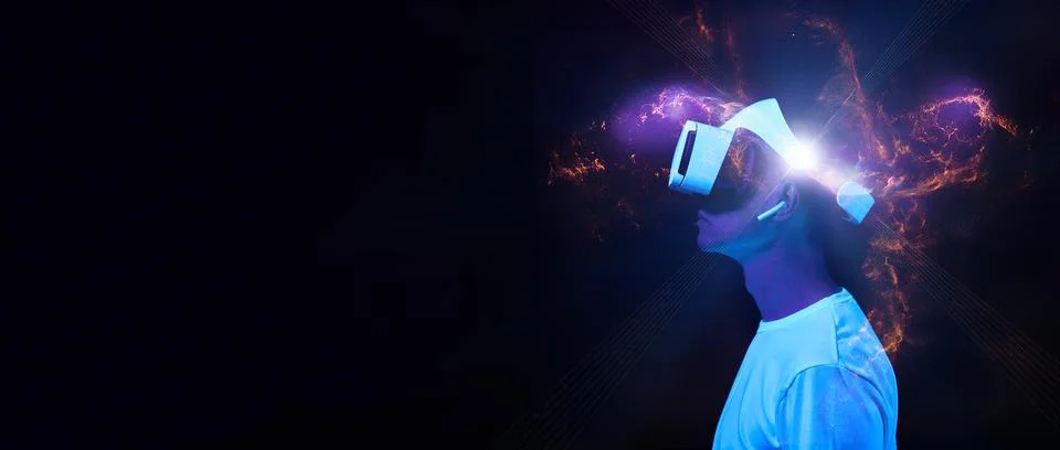 Man is using virtual reality headset. Elements of this image furnished by NASA. Stockfoto's