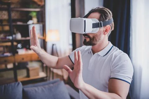 Man using virtual reality headset Stock Photos