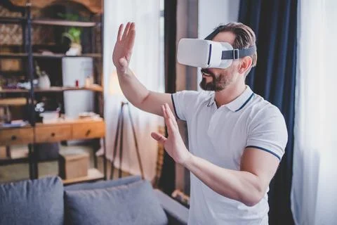 Man using virtual reality headset Stock Photos