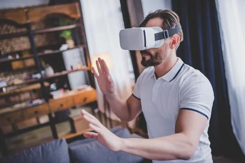 Man using virtual reality headset Stock Photos