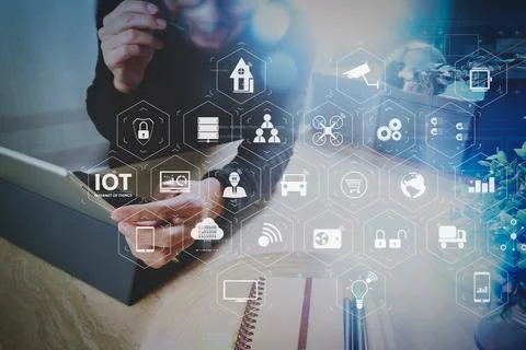 Man using VOIP headset with digital tablet computer docking smart keyboard,.. Stock Photos