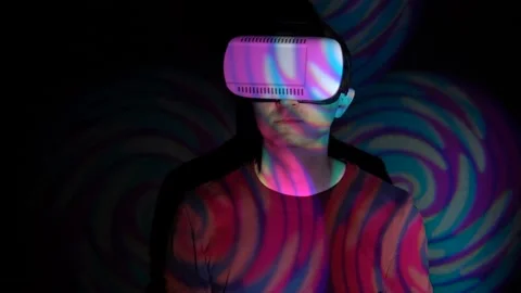 Man using VR-glasses in the spotlight Stock Footage 86820813