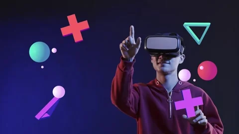 Man using VR headset lifting right finger selecting 3D spheres and moving purple Stock Footage 335465546