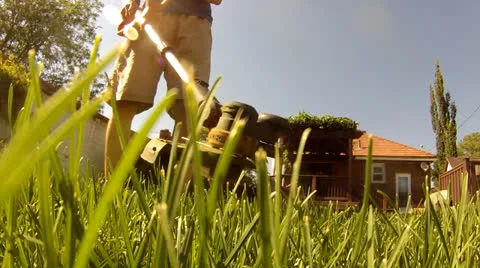 Man Using Weed Trimmer 2 Stock Footage 27206017