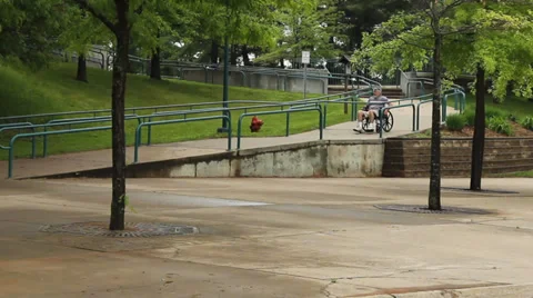 Man using a wheelchair access ramp Stock Footage 39202276