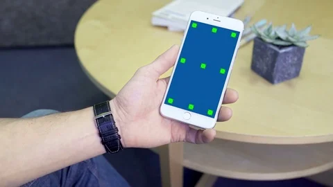 Man using White Smartphone Display Screen with Touch Gestures Stock Footage 75383805