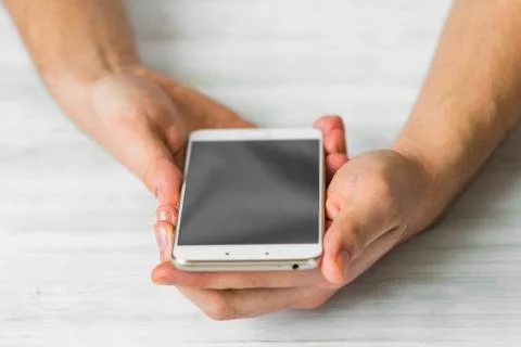 Man using white smartphone screen smart phone hands close up Photos