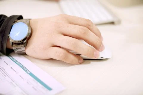 Man is using a wireless mouse Stock Photos