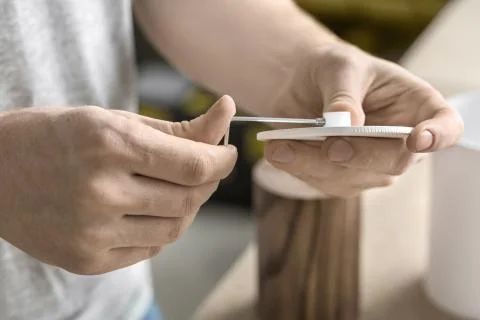 Man using wrench in workshop 스톡 사진