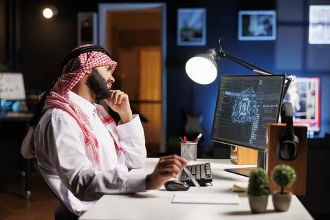 Man utilizing AI on his desktop computer Stock Photos
