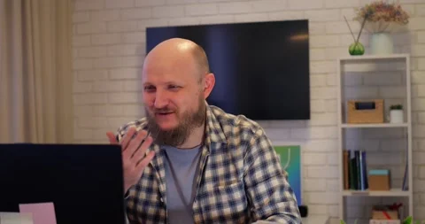 Man utilizing digital tools for effective communication, tools enhancing remote Stock Footage 301525576