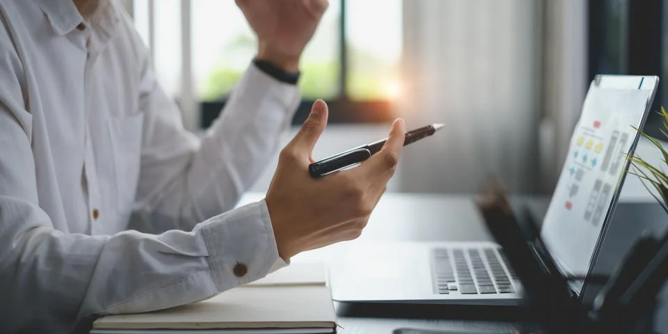 Man ux developer and ui designer makeing flow chart and interface app in Stock Photos